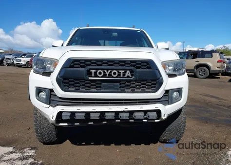 2018 Toyota Tacoma Trd Off Road z USA, uszkodzony, nr VIN 3TMCZ5AN9JM153498